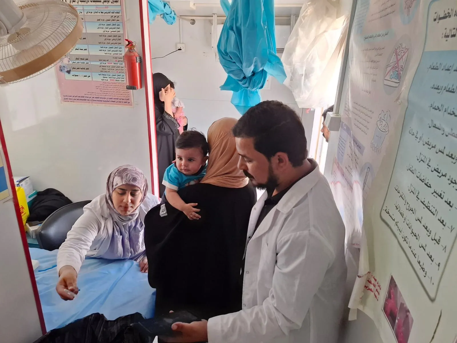 A family with the doctor, Mobile Health Clinic