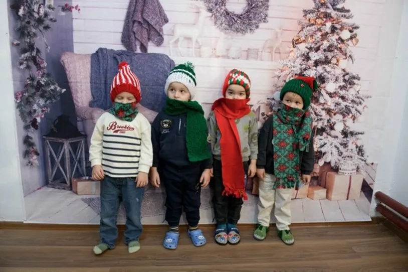 Children in their new hats and scarves